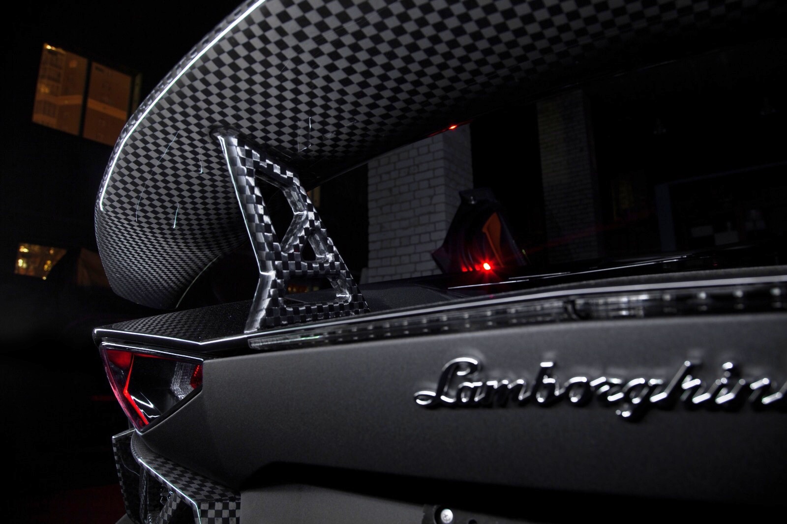 Chequered carbon fiber pattern on Lamborghini rear wing